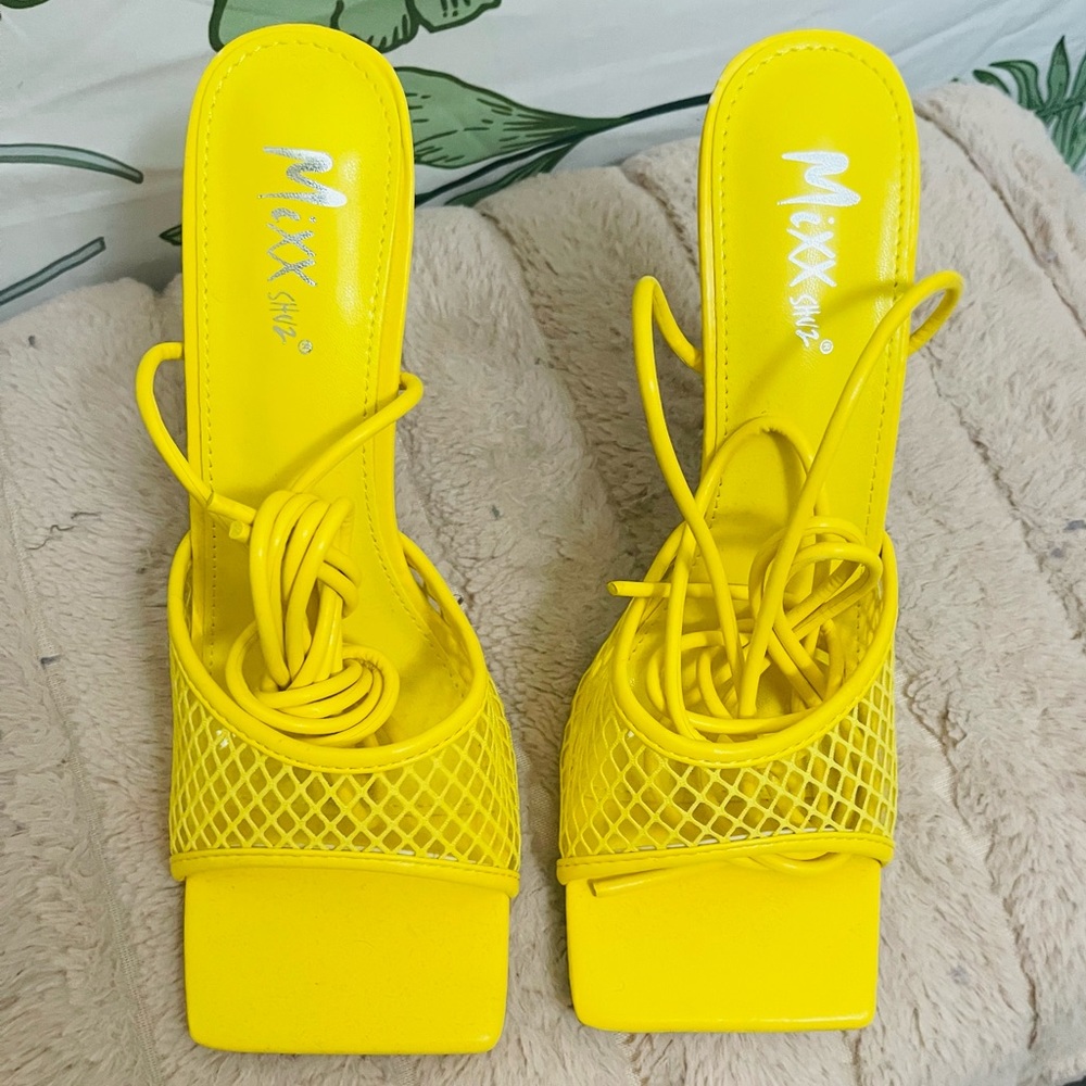 Fishnet lace up Heels